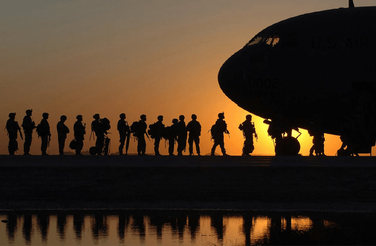 Soldiers boarding a plane
